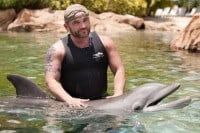 Survivor Villain Russell Hantz with Dexter at Discovery Cove in Orlando