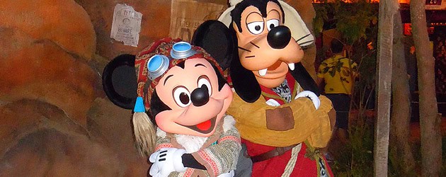 Mickey Mouse and Goofy greet guests as mountain climbers at Expedition Everest 5th anniversary Disney World annual passholder event
