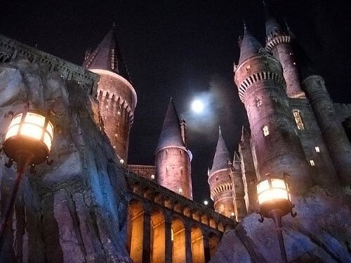 Hogwarts Castle at night in the Wizarding World of Harry Potter