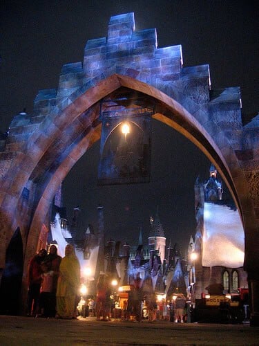 Hogsmeade Village entrance at night in the Wizarding World of Harry Potter