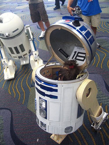 Girl resting inside R2-D2