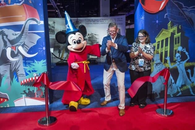MICKEY MOUSE, ADAM SANDERSON (Senior Vice President, Corporate Communications, The Walt Disney Company), BECKY KLEIN
