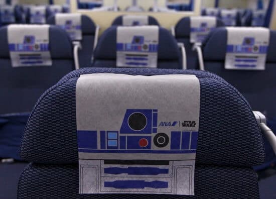 r2-d2-headrests-line-the-rows-of-seats-other-items-including-cups-and-napkins-are-also-designed-with-an-r2-d2-theme