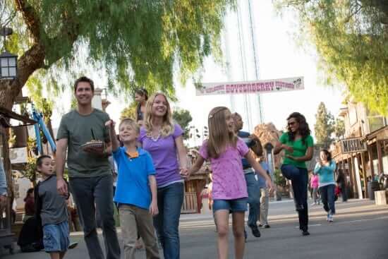 Family of four with Boysenberry Festival Banner