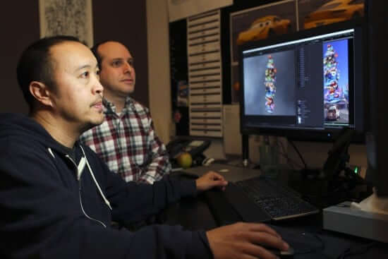 Gus Dizon and Michael Comet work on "Cars 3," as seen on March 21, 2017 at Pixar Animation Studios in Emeryville, Calif. (Photo by Deborah Coleman / Pixar)